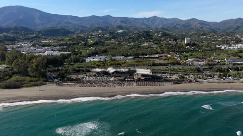 Aerial View of Beach Resort and Mountains in Estepona Spain Stock Footage 343257977