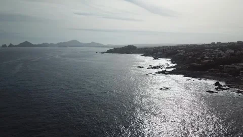 Aerial view of a beach with rocks and waves during the day in Los Cabos Stock-Footage 280445802