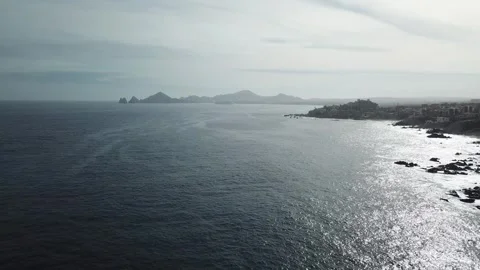 Aerial view of a beach with rocks and waves during the day in Los Cabos Stock-Footage 280445819