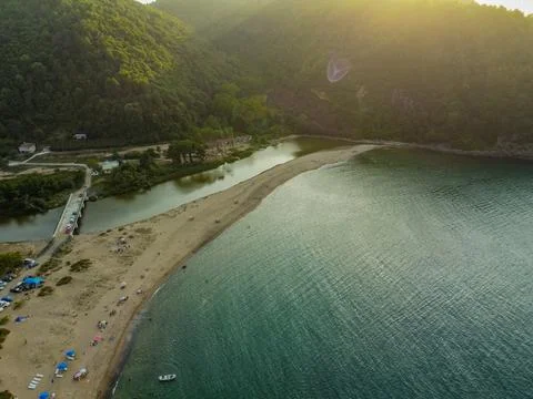 Aerial view of the beach at sunset from a drone 库存照片