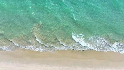 Aerial view with beach in wave of turquoise sea water shot Stock Footage 236376594