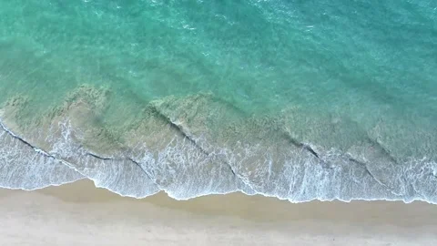 Aerial view with beach in wave of turquoise sea water shot Stock Footage 237319997