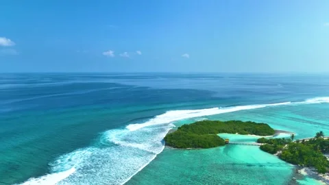 Aerial view with beach in wave of turquoise sea water shot Stock Footage 240397136