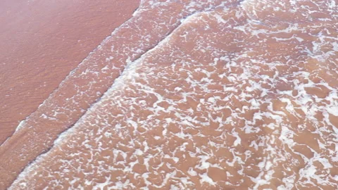 Aerial view of beach with waves on beech drone view England UK 4K Видео 232840073