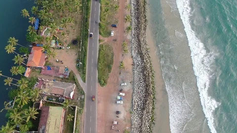 An aerial view of beach waves splashing Stock Footage 100906224