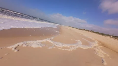 Aerial view of beach with waves washing sand. After the storm Video stock 345058548