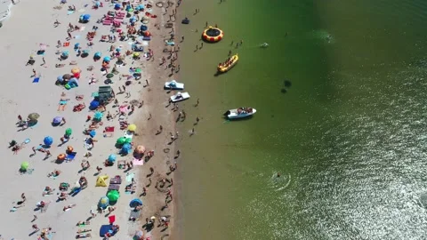 Aerial view of the beachfront in the middle of a hot summer day. 스톡 동영상 159014359