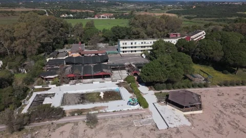 Aerial View of Beachfront Resort Complex and Empty Pool Near Kalamata Stock-Footage 330964648