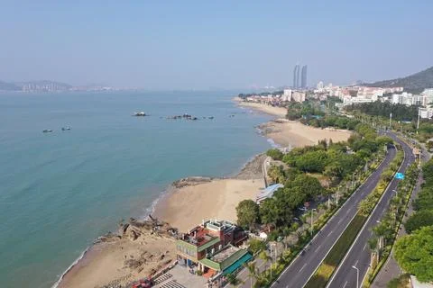 Aerial View of Beachside Cafe and Rocky Shore in Xiamen Stock Photos