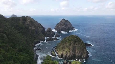 AERIAL VIEW BEATIFUL  ROCK BEACH AT LOMBOK ISLAND INDONESIA Stock Footage 232452414