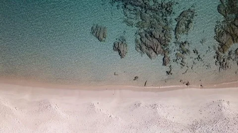 Aerial view of a Beautiful Beach with the Rocks under the sea Stock-Footage 101425482