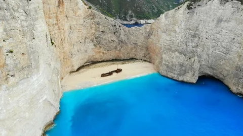 Aerial view of beautiful beach with a stranded ship in Zakynthos, Greece Stock Footage 121579172