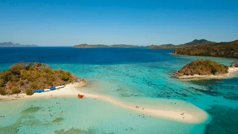 Aerial view beautiful beach on a tropical Bulog Dos Island. Philippines. Stock Footage