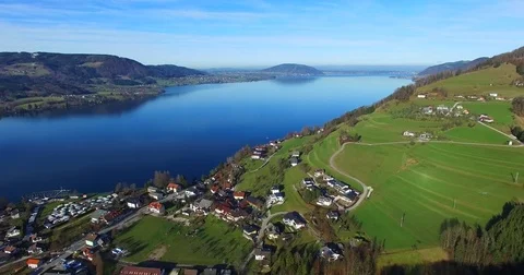 Aerial view, beautiful clear alpine lake Attersee with blue water, salzkamme Stock Footage 84906110