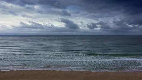 Aerial view to a beautiful clouds over empty beach 스톡 동영상 296059486