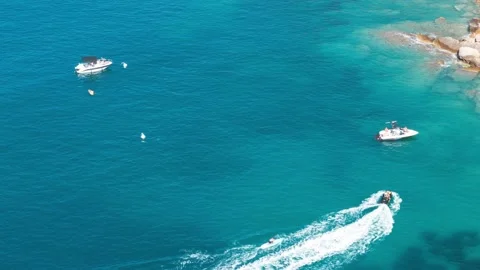 Aerial view to beautiful deep blue sea water surface with boats and ships Stock Footage 155617587