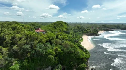 Aerial view of beautiful empty tropical beach in Yogyakarta, Indonesia. Stock Footage 231398148