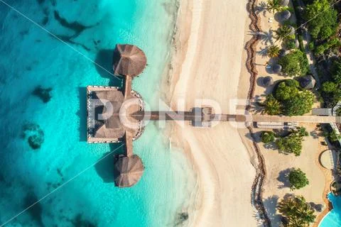 Aerial view of beautiful hotel in Indian ocean at sunrise Stock Photos