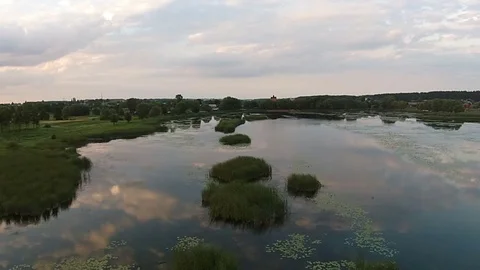 Aerial view of beautiful lake at evening Stock Footage
