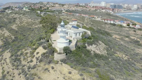 Aerial view of the beautiful lighthouse of Cabo Huertas, Spain. Stock Footage 168898974