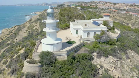 Aerial view of the beautiful lighthouse of Cabo Huertas, Spain. Stock Footage 168899064