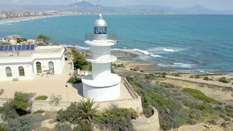 Aerial view of the beautiful lighthouse of Cabo Huertas, Spain. Stock Footage 168899523