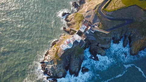 Aerial view of beautiful lighthouse on a cliff in Howth, Ireland 库存影片 87766865