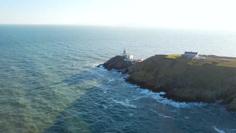 Aerial view of beautiful lighthouse on a cliff in Howth, Ireland Stock-Footage 87781786