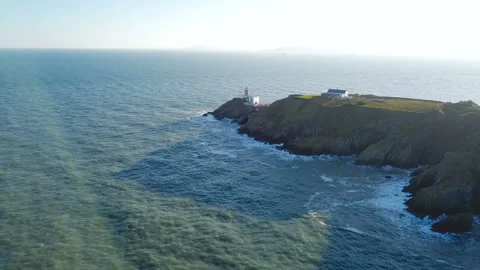 Aerial view of beautiful lighthouse on a cliff in Howth, Ireland 스톡 동영상 87782550