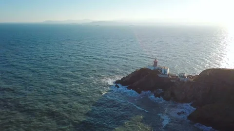 Aerial view of beautiful lighthouse on a cliff in Howth, Ireland Stockbeeldmateriaal 87782862