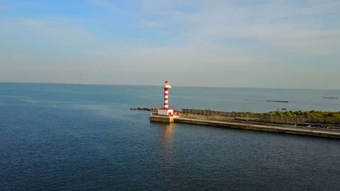 Aerial view of beautiful lighthouse in a sea Stock-Footage 79490873