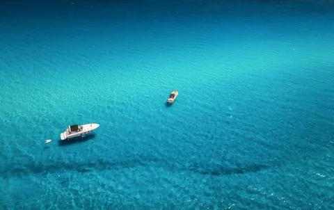Aerial view of beautiful luxury yacht and boat in blue sea Stock Photos