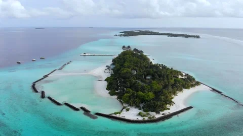 Aerial view of beautiful Maldive island water villa bungalows, Summer Island Stock Footage 145757553