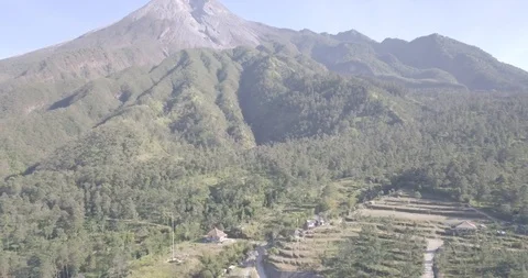 Aerial view of beautiful Merapi Mountain with the village below it in Yogyaka Stock Footage 118794837