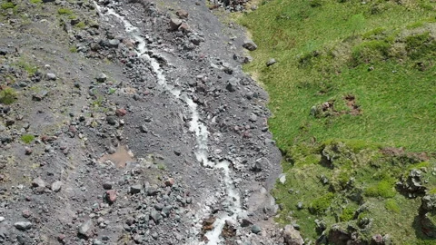 Aerial view of a beautiful mountain waterfall. Summer landscape in the mountains 스톡 동영상 136520873