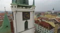 Aerial view of beautiful old clock on gothic city hall tower, historic landmark 4k or 4k+ Resolution