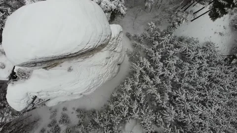 Aerial view of a beautiful panoramic view of a group of sandstone rock in winter Stock Footage 148076214
