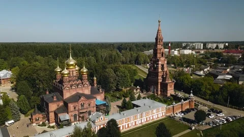 Aerial view of a beautiful red brick Christian church Stock Footage 310872966