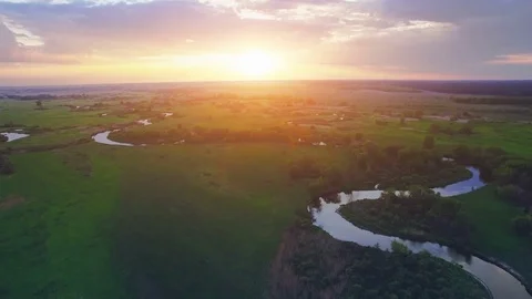 Aerial View: Beautiful river landscape in sunset Stock Footage