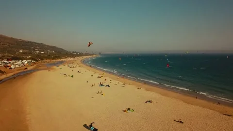 Aerial view of the beautiful sandy beach Playa de Valdevaqueros with many kiters Vidéo 155980149