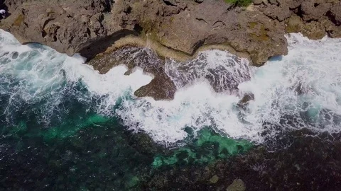 Aerial view of beautiful sea waves and rocks Stock Footage