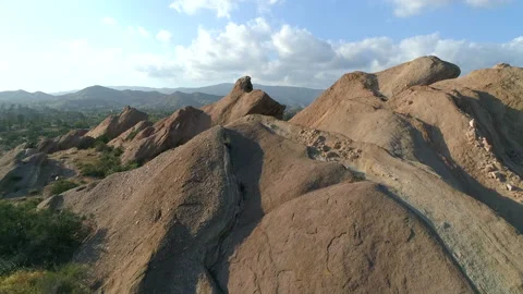 Aerial view of beautiful, steep rocks with clear, blue skyline in the background Stock Footage 225618062