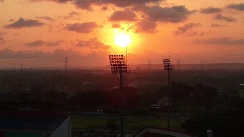 Aerial view of beautiful sunset and silhouette of lights and Sultan Agung Stock Footage 321663158