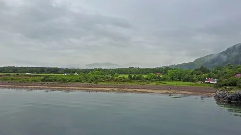 Aerial view of the beautiful village of Benderloch with dramatic skys during the Stock Footage