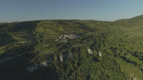 Aerial view of beef cows grazing in the mountains. Stock Footage 129561569