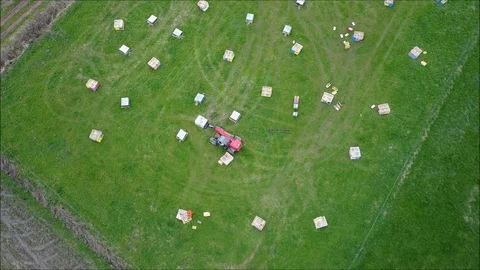 Aerial view of a beekeeper around his hives Stock Footage 88818829