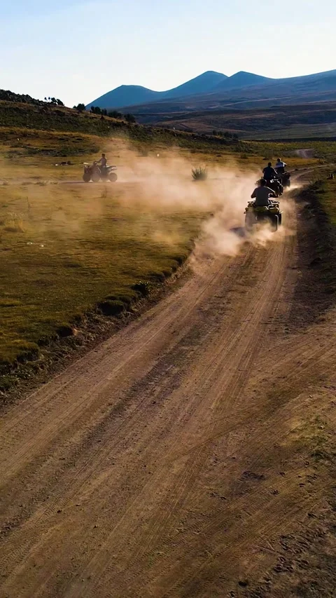 Aerial View Behind Atvs By Lake Mountain Vertical Video Видео 334883451