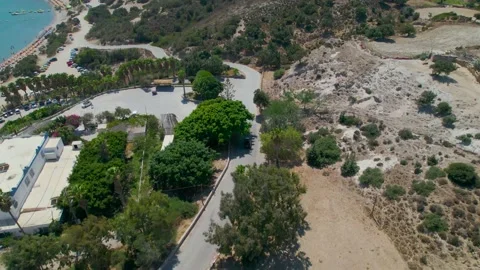 Aerial view behind car approaching Paradise Beach, Kos, Greece Stock Footage 162948891