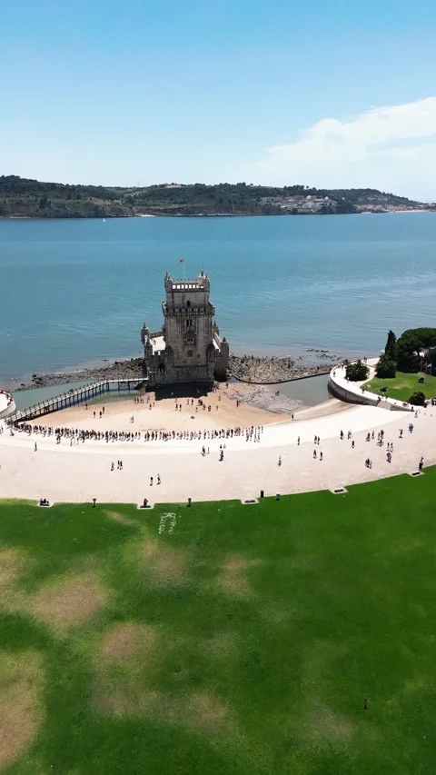 Aerial view of Belem Tower on Tagus river in Lisbon, Portugal Evening time Stock Footage 283510696