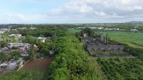 Aerial view of Belle Mare Sugar Mill ruins in Quatre Cocos, Mauritius. Stock Footage 346394076